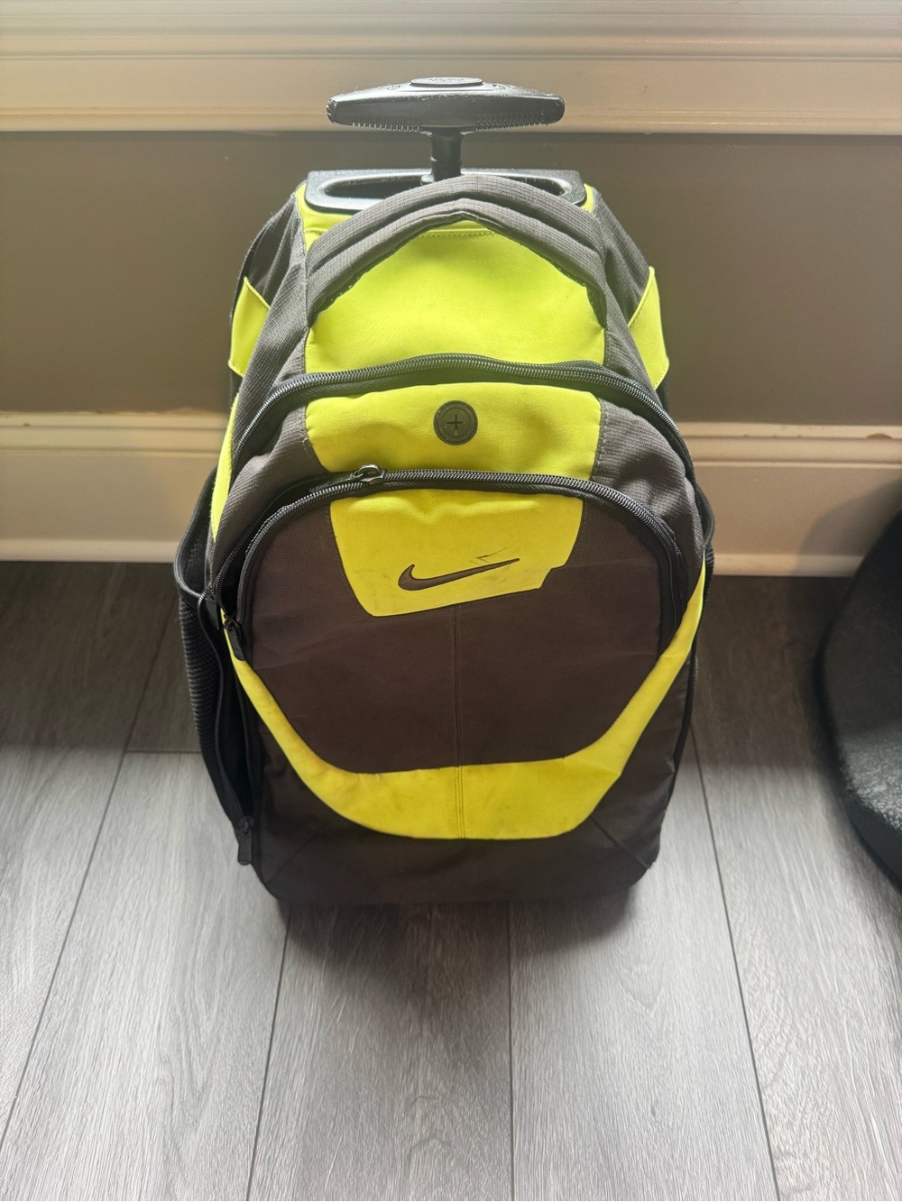 Nike Men’s rolling Backpack with Neon Yellow and Black Accents carry-on